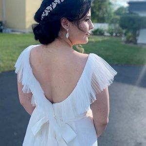 Beautiful Vera Wang wedding dress in ivory/nude color. Size 12. Worn only once.